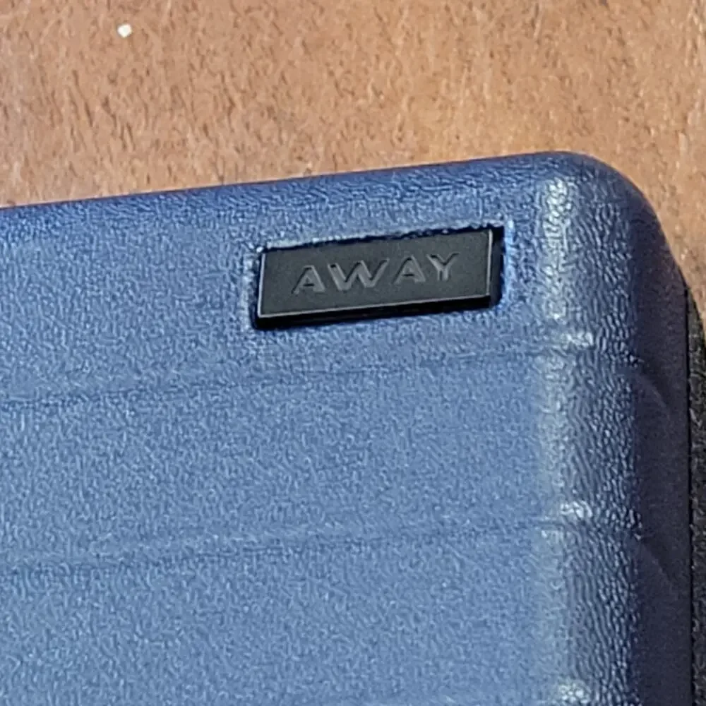 New AWAY Travel The Mini Suitcase Toiletry Case United Polaris Amenity Kit Pouch
